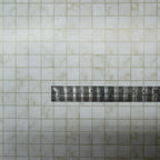 1:12 scale miniature marble square tile peel and stick flooring paper in beige, half inch tiles with tan grout lines, with a ruler
