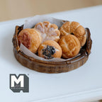 1:12 scale miniature oval bread basket with handles and 5 pastries, set of 6, brown woven basket lined with paper