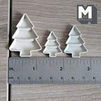 1:12 scale miniature Christmas tree shaped trays in ivory white, set of 3 graduated sizes, shown with a ruler