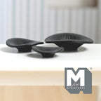 1:12 scale miniature ribbed texture shallow bowls in black, set of 3 sizes, wide curved shape, shown on a white table