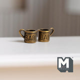 Miniature Metal Baby Mugs Set of 2 . 1:12 Scale Dollhouse Kitchen Accessories Drinkware 5/16 inch tall (copper) -