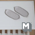 1:12 scale miniature metal oval plates in warm gray, set of 2, long platters with small handles, on a white table