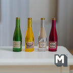 1:12 scale miniature wine and spirits bottles in resin, set of 4, assorted green, yellow, clear and red with labels