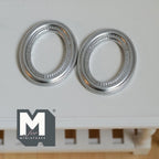 1:12 scale miniature metal ornate oval picture frames in silver, small, set of 2, shown empty on a white table