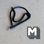 1:12 scale miniature non working headphone cable with jack plug in black, coiled, shown on a tabletop