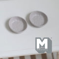 1:12 scale miniature metal irregular shaped food bowls in warm gray, set of 2, round and shallow, on a white table
