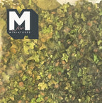 1:12 scale miniature mixed foliage tree leaves, color E, close view of loose green and olive leaf scatter