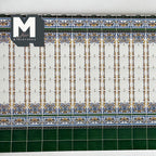 1:12 scale miniature Mediterranean embossed tile wall sheet in blue and gold on white with a green dado