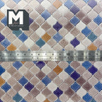 1:12 scale miniature embossed Moroccan arabesque tile sheet in multicolor blue, beige and orange, shown with a ruler