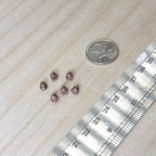 1:12 scale miniature metal round cabinet knobs in antique copper, set of 6, shown beside a coin and a ruler