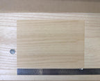 1:12 scale miniature oak peel and stick wood veneer sheet in light oak with fine grain, shown with a ruler and coin