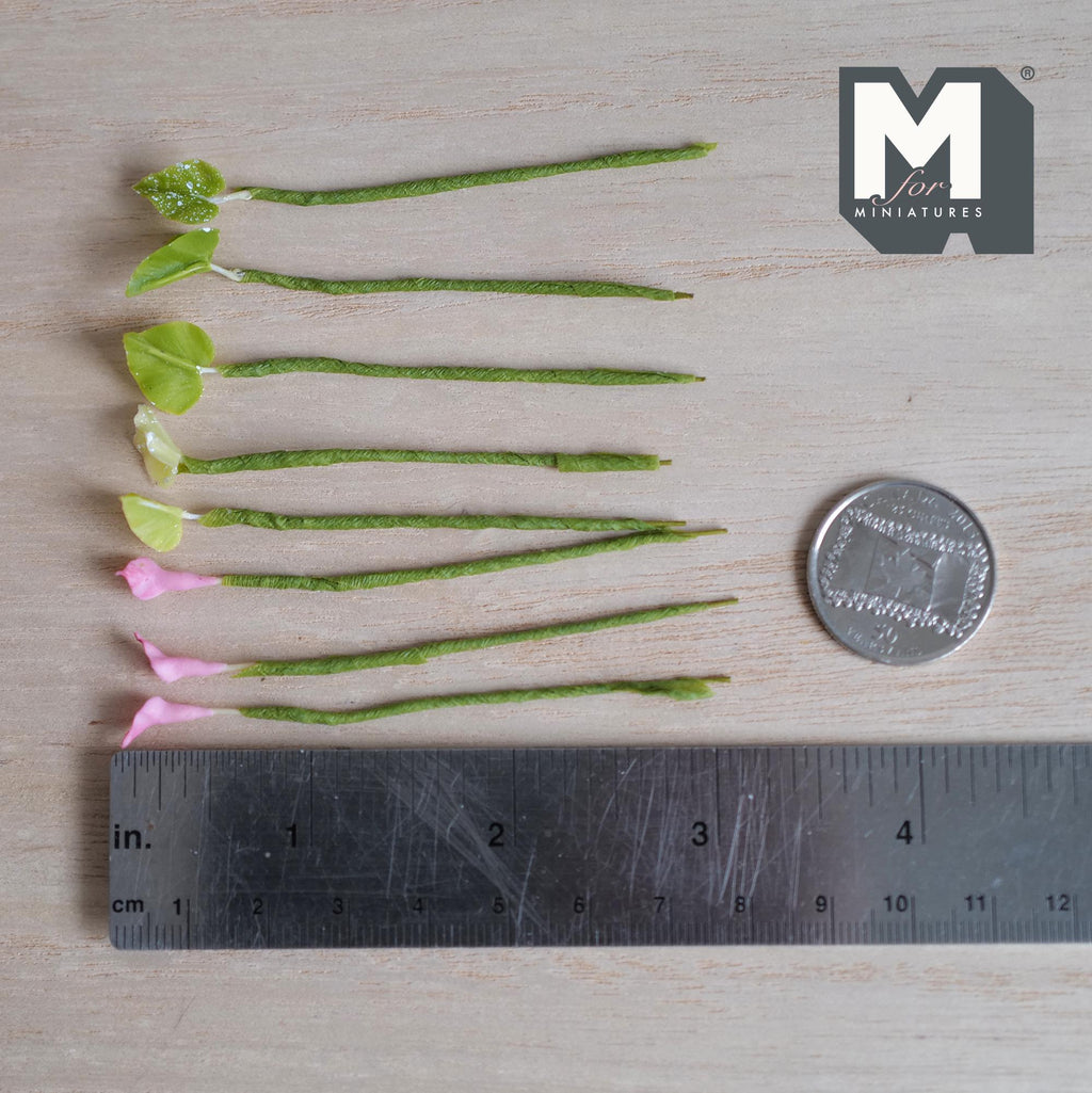 1:12 scale miniature pink calla lily flower stems with orange centers and lime green speckled leaves on green wrapped stems