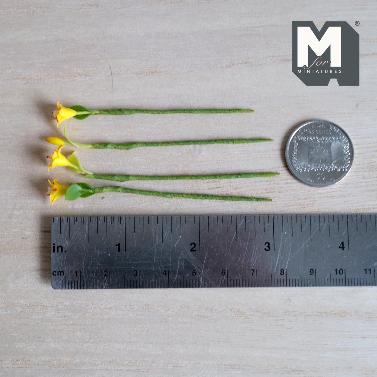 1:12 scale miniature yellow lily flower stems with red speckled petals, one closed bud and small green leaves