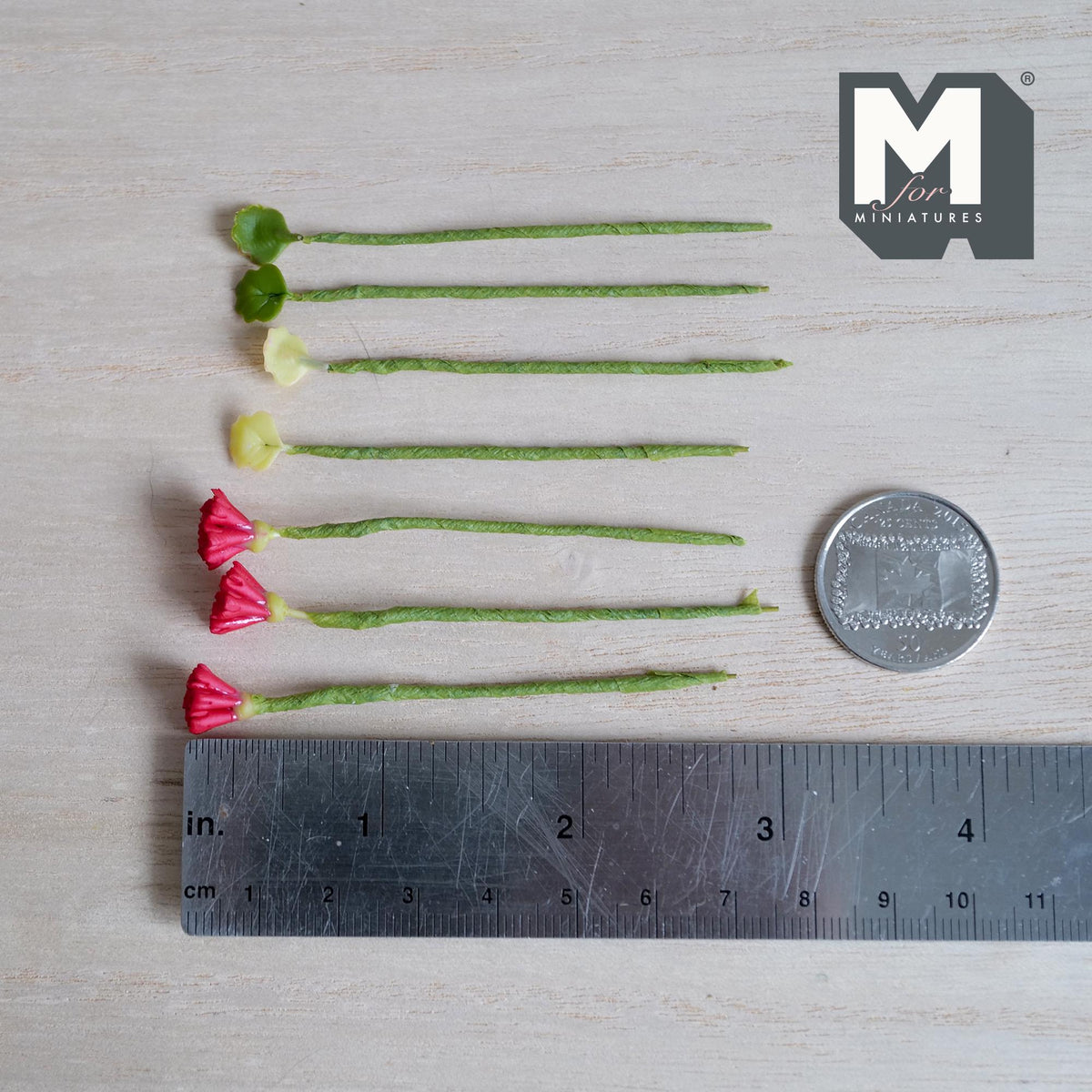 1:12 scale miniature red carnation flower stems with pale green buds and leaf stems on green wrapped stems