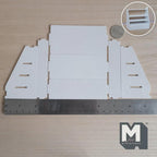 Unassembled 1:12 scale miniature 4 tier stepped display shelf kit in white wood, laid flat beside a ruler and coin, with an inset of the assembled shelf