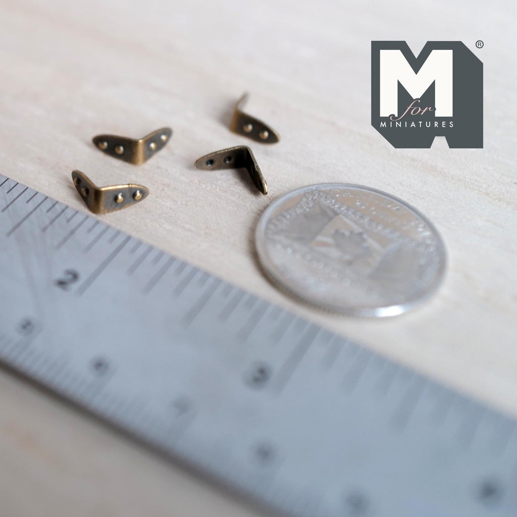 1:12 scale miniature antique brass metal angle corner brackets, set of 4, each bent at a right angle with two small holes on each side