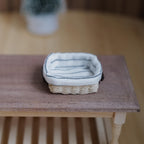 1:12 Scale Miniature Rectangular Woven Bread Basket with Striped Linen Lining and Faux Leather Handles, 1-5/8 inch long, Dollhouse Decor