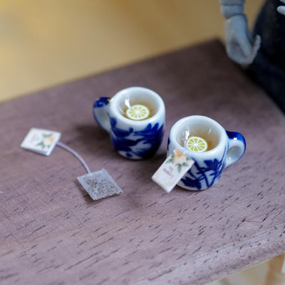1:12 Scale Miniature Blue and White Floral Ceramic Lemon Tea Mugs with Tea Bags, Set of 2, 1/2 inch tall, Dollhouse Decor (non edible)