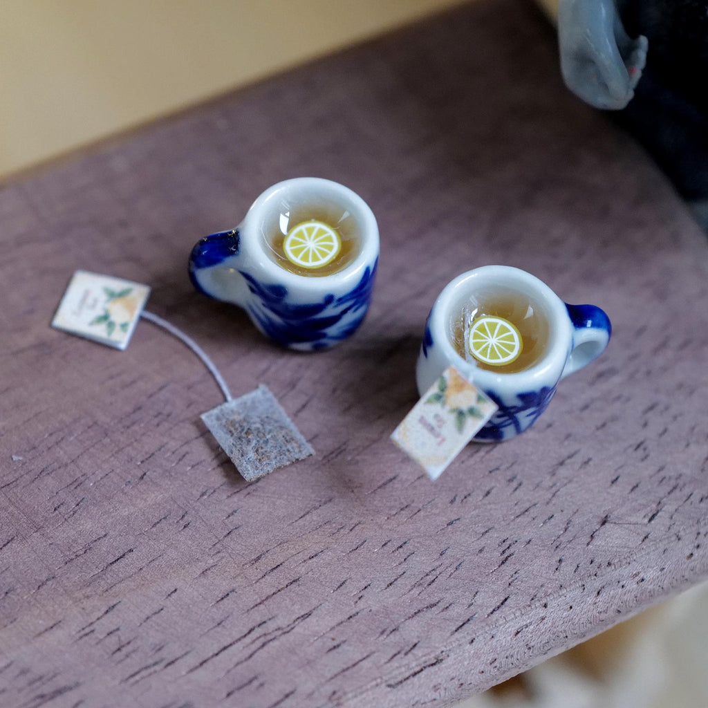 1:12 Scale Miniature Blue and White Floral Ceramic Lemon Tea Mugs with Tea Bags, Set of 2, 1/2 inch tall, Dollhouse Decor (non edible)